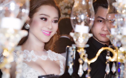 Lâm Khánh Chi cùng hôn phu điển trai dự tiệc cưới của Bảo Duy