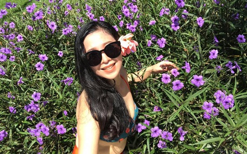 Nhan sắc trẻ đẹp của vợ ca sĩ Trọng Tấn trong trang phục bikini