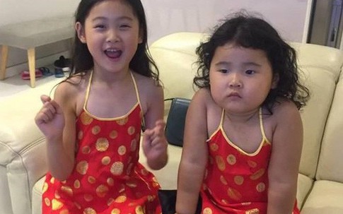 Hai con gái đáng yêu, giỏi ngoại ngữ của Hương Giang