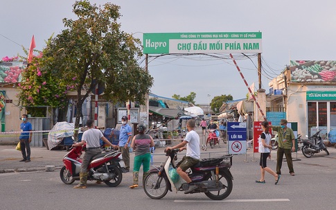 Hình ảnh chợ đầu mối phía Nam mở cửa trở lại sau 25 ngày bị phong tỏa