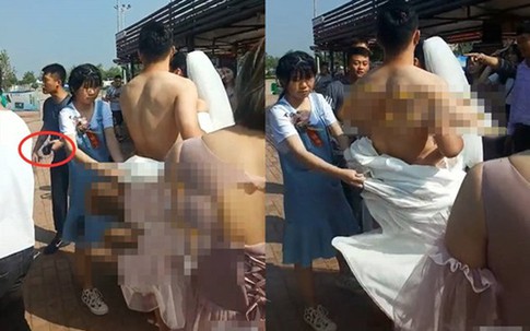 Chú rể bị lột trần, cô dâu nức nở dùng váy che cho chồng