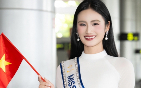 Hoa hậu Ý Nhi rạng rỡ trong tà áo dài trắng khi trở về từ Miss World
