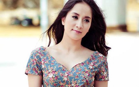 Khánh Thi đẹp dịu dàng trong sắc vàng cổ điển