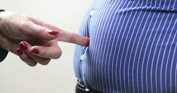What are the beliefs or sayings associated with men having a big belly that suggest they are wealthy or successful?