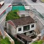 Số phận ngôi nhà 'cứng đầu' sẵn sàng nằm giữa đường cao tốc không chịu di dời dù được đền bù tới 6 tỷ đồng hiện ra sao?