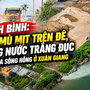 Ninh Bình: Bụi mù mịt trên đê, dòng nước trắng đục chảy ra sông Hồng ở Xuân Giang