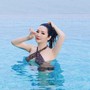 Hoa hậu là mẹ đơn thân khoe body đẹp 'mướt mắt' ở tuổi trung niên